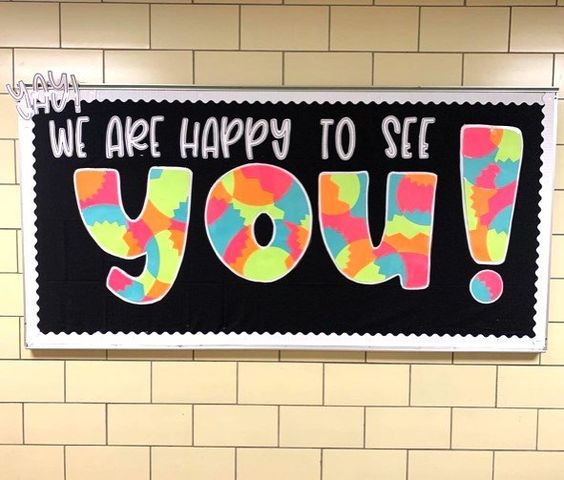 "We Are Happy to See You!" Bulletin Board